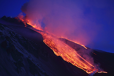 April 1, 2012 - Lava flowing into Valle del Bove at Mount Etna Volcano, Italy, following paroxysmal eruption.