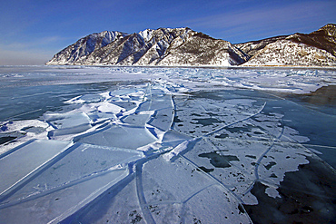 Old ice breaking under newer ice when the lake froze, Lake Baikal, Russia.