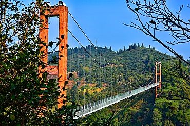 Suspension bridge leading into Huangling ancient village in Wuyuan County, Shangrao City, Jiangxi Province, China. The village dates back to the Ming Dynasty more than 500 years ago and is known for its natural beauty.