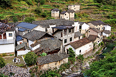 Creek running through the picturesque Shanxiabao village, Wuyi County, Jinhua City, Zhejiang Province, China. Under cultural protection, the 800 year old ancient village was featured in Chinese National Geography and still has buildings from 1723-1735.