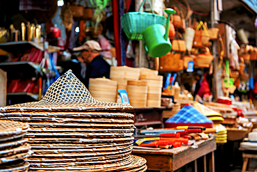 Household items and woven hats at Youbu Old Town, Lanxi County, Jinhua City, Zhejiang, China. Located at the intersection of 4 provinces, merchants have gathered here since the Ming Dynasty and is renowned for its 5a.m. morning tea (breakfast) culture.