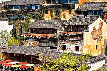 Huangling ancient village in autumn when chillies, grains and other farm produce is sun dried. Wuyuan County, Shangrao City, Jiangxi Province, China. The village dates back to the Ming Dynasty more than 500 years ago and is known for its natural beauty.