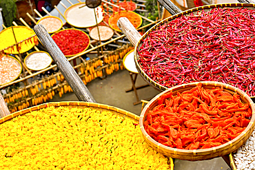 Chillies, corn and other produce being sun dried in autumn, Huangling, Wuyuan County, Shangrao City, Jiangxi Province, China. Huangling is an ancient village that dates back to the Ming Dynasty more than 500 years ago and is known for its natural beauty.