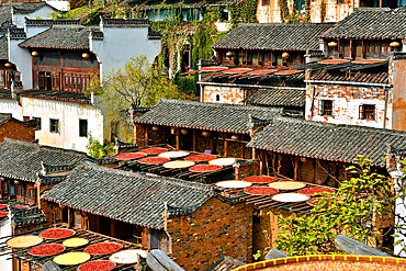 Huangling ancient village in autumn when chillies, grains and other farm produce is sun dried. Wuyuan County, Shangrao City, Jiangxi Province, China. The village dates back to the Ming Dynasty more than 500 years ago and is known for its natural beauty.