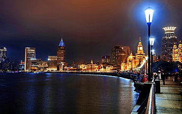 Magnificent view of the Bund at night along the Huangpu River, Shanghai, China
