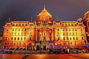 Magnificent view of brightly lit heritage buildings along the Bund at night, Shanghai, China