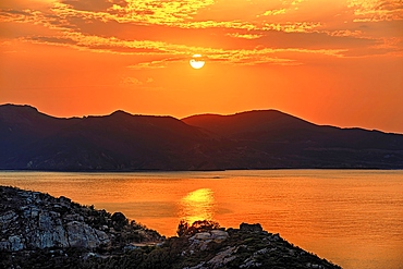 Golden sunset over the hills and the sea of Pingtan Island, Fuzhou City, Fujian Province, China.