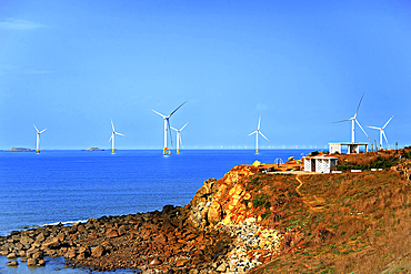The coast of Pingtan Island with a spectacular view of windmills in the sea. Pingtan Island, Fuzhou City, Fujian Province, China.