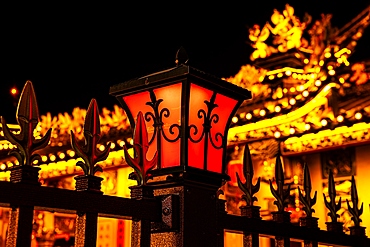 Beautiful lanterns on the gates of an ancestral hall in Puning City, Guangdong Province, China. Such halls or temples are used for collective rituals and festivals in honor of the ancestors and also for other family and community-related functions.