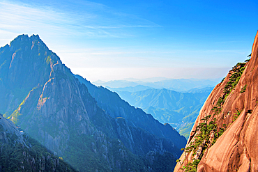 Misty mountain scapes of Huangshan (Mt Huang/Yellow Mountain), UNESCO World Heritage and UNESCO Global Geopark, Anhui Province, China.