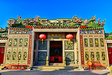 Wu'di temple on Nan'ao Island, Shantou City, Guangdong Province, China. The temple worships the God of War, Guanyu of the Three Kingdoms. Note the intricate porcelain inlay sculptures on the rooftop, a unique cultural heritage artform of the region.