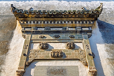 Exquisite heritage decorative stone carvings on the doorway of a village home in ShiTing Village, Huangshan City, Anhui, China. This is one of many ancient villages in Huangshan.