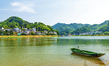Green boat on XinAn River, WuFuShan Village, Huangshan, Anhui Province, China