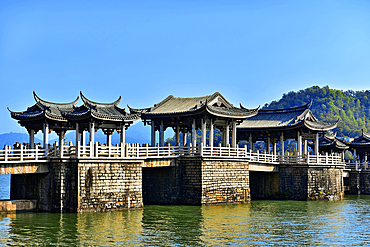 The pavilions of Guangji Bridge. The bridge was built in 1170, is one of China's four famous ancient bridges, Chaozhou, Guangdong province, China. The bridge is connected by 18 boats that can be moved to allow passage for vessels.