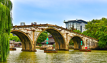 The 98m Gongchen Bridge over the Grand Canal, Hangzhou, Zhejiang Province, China. The bridge was originally built in 1631 (rebuilt 1885). The Grand Canal is a UNESCO World Heritage and one of the most important waterways that served China for 2500 years.