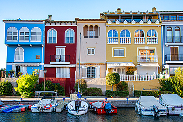 'Port Sa Playa, Valencia, Spain - 12/08/2021: Bright sunny day panoramic photo looking at Port Saplaya, Valencia's Little Venice'