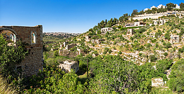 Jerusalem,Israel - April 17,2025. Panoramic view of ruined houses of an ancient arabian abandoned village Lifta located on hills near Jerusalem, Israel.