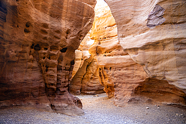 Amazing labyrinths in the gorge of the red canyon in Eilat, israel carved by water flows in the red sandstone rocks