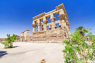 Clear summer sky over the ancient Trajan's Kiosk, Temple of Philae, Aswan, Egypt