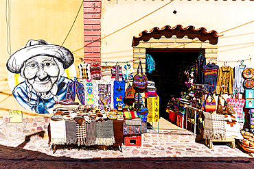 Souvenirs shops decorated with murals, Humahuaca, Jujuy province, Argentina
