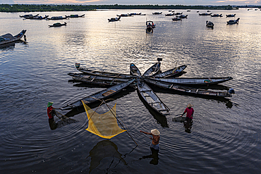 Traditional fishing on the Perfume River, Hue, Thua Thien-Hue province, Central Vietnam. (MR)