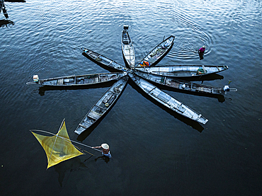 Fishermen with traditional boats and nets, Hue, Thua Thien-Hue province, Central Vietnam. (MR)