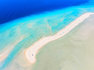 Blue and turquoise shades of sea washing the white sand of Sotavento beach, aerial view, Fuerteventura, Canary Islands, Spain