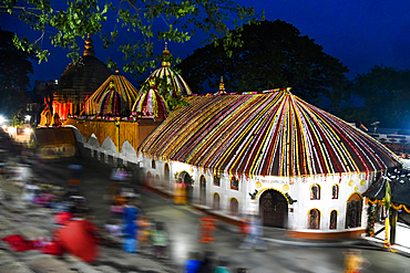 Devotees throng the historic Kamakhya Temple in Guwahati, Assam, one of the most revered Shakti Peethas in India, during a religious festival, showcasing vibrant spirituality and ancient temple architecture in Northeast India.