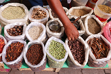 Vendor selling spices for Biryani (mixed rice dish) at a market during the holy fasting month of Ramadan