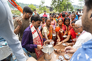 Devotees throng to have food as they arrives to visit Kamakhya Temple during Ambubachi Mela, in Guwahati, India on June 22, 2025.