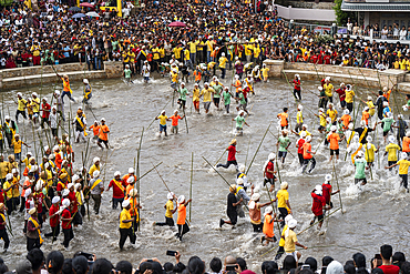 People from the Pnar community march in a circle as they celebrate an event organized to mark the Behdienkhlam festival in Jowai, India, on July 14, 2025.