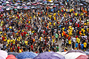 People from the Pnar community march in a circle as they celebrate an event organized to mark the Behdienkhlam festival in Jowai, India, on July 14, 2025.