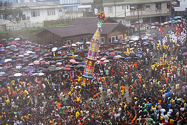 People from the Pnar community march in a circle around a Rot as they celebrate an event organised to mark the Behdienkhlam festival in Jowai, India, on July 14, 2025.