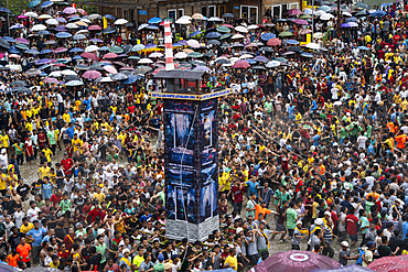 People from the Pnar community march in a circle around a Rot as they celebrate an event organised to mark the Behdienkhlam festival in Jowai, India, on July 14, 2025.