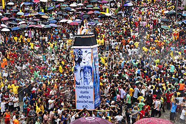 People from the Pnar community march in a circle around a Rot as they celebrate an event organised to mark the Behdienkhlam festival in Jowai, India, on July 14, 2025.