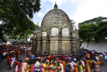 Devotees throng the historic Kamakhya Temple in Guwahati, Assam, one of the most revered Shakti Peethas in India, during a religious festival, showcasing vibrant spirituality and ancient temple architecture in Northeast India.