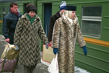 Women in fake furs at Kazan station, Moscow, Russia, Europe