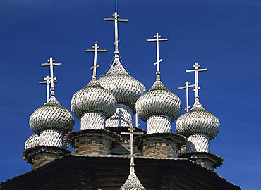 Close-up of the domes and crosses on top of the Transfiguration Cathedral on Kizhi Island, Karelia, Russia, Europe