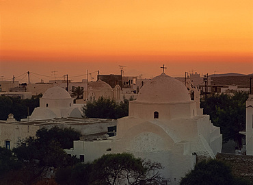 White domes of the Chora at sunset on Folegandros, Cyclades, Greek Islands, Greece, Europe