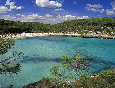 swimmers and sun bathers at the beach at Cala Mondrago Nature Park
Mallorca, Spain *** Local Caption ***