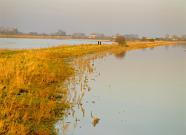 Walkers on The Fens in November, Norfolk, England