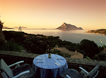 Isola Tavolara at sunset from terrace, northeast coast, island of Sardinia, Italy, Mediterranean, Europe