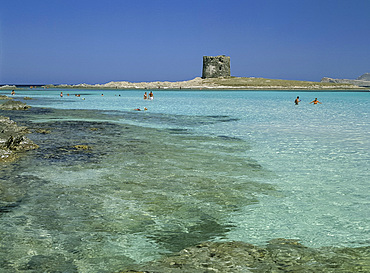 La Torre della Pelosa and people in the sea, Stintino, island of Sardinia, Italy, Mediterranean, Europe