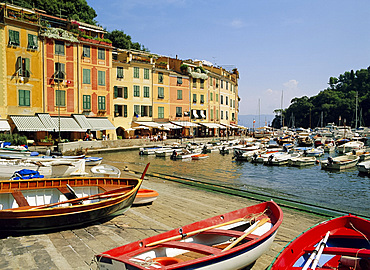 Old buildings and boats in the harbour at Portofino, Liguria, Italy