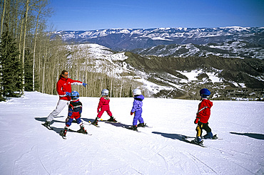 Children learning to ski at Snowmass, near Aspen, Colorado, United States of America, North America