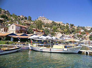 Old boats in the harbour, Kalekoy, Simena, Anatolia, Turkey, Asia Minor, Asia