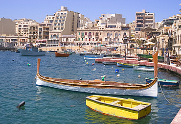 Traditional long wood boat in the harbour, St. Julian's, Malta, Mediterranean, Europe