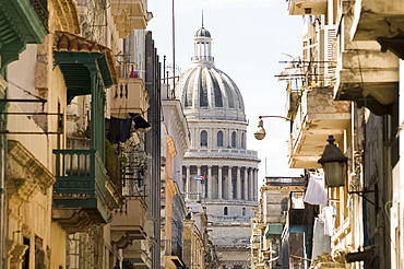 A view of the Capitolio seen through the streets of Habana Vieja (old town), Havana, Cuba, West Indies, Central America