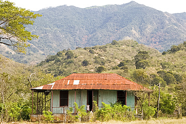 A typical tin roofed house in the mountains near Santiago de Cuba, Cuba, West Indies, Central America