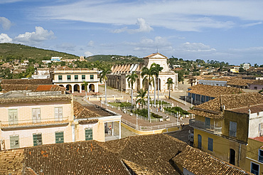 An elevated view of the terracotta roofs and the Iglesia Parroquial de la Santisma Trinidad, Trinidad, UNESCO World Heritage Site, Cuba, West Indies, Central America